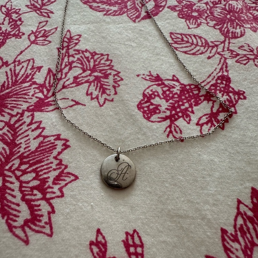 Tiffany & Co. Tiffany Notes Alphabet disc charm pendant, “A” initial